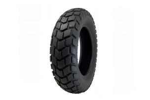 EMMO 30/90-10 motorcycle tire for winter riding, deep tread anti-slip pattern, heavy-duty scooter tire replacement, durable e-motorcycle wheel part for reliable snow traction