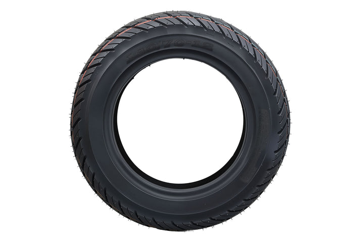 EMMO 130/70-12 rear wheel tubeless tire installed on electric moped showing wide contact patch, balanced rubber compound, and steady road contact for city and suburban use